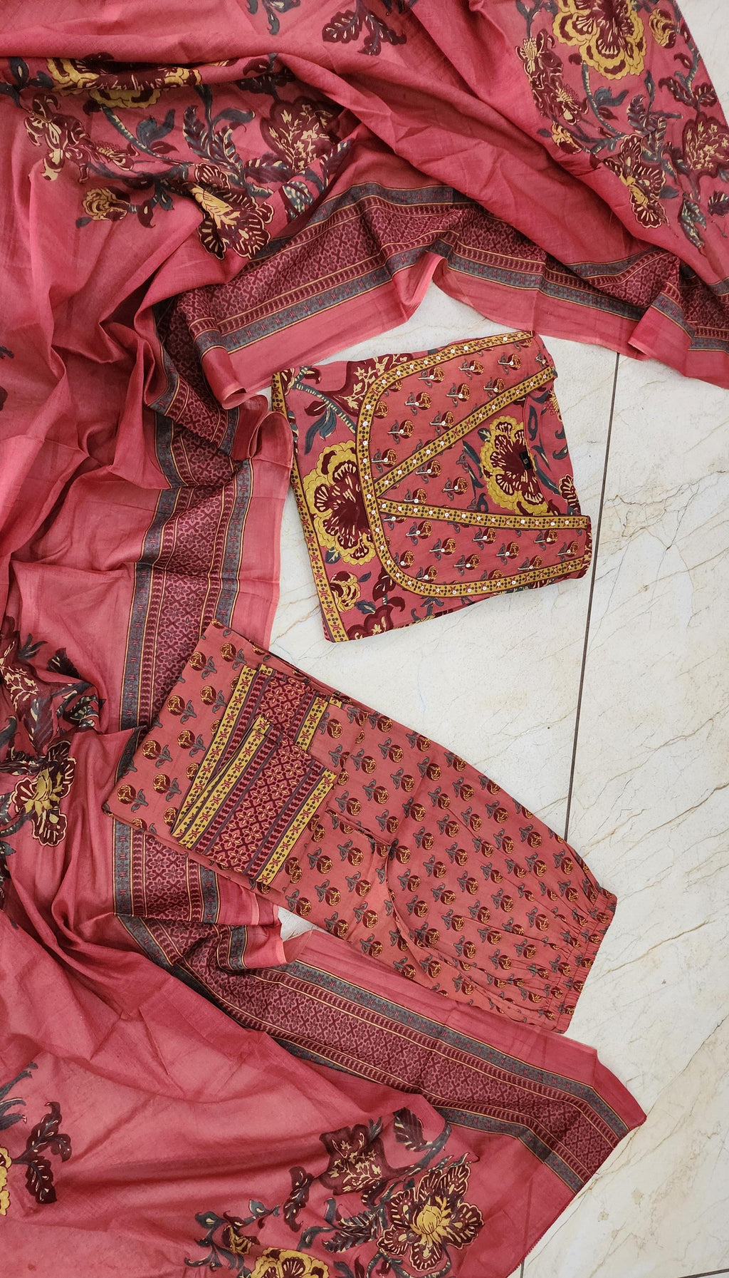 Premium cotton Anarkali suit set with hand work detailing on yoke paired with matching pant and full dupatta.(PFAB160)