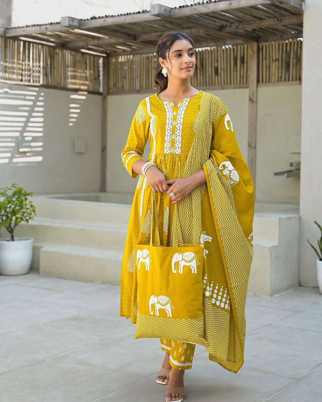Jaipur cotton candy suits Look Nyra cut out of a dreamy movie set as you turn around and walk in this elegant flaired suit ! The perfect of traditional wear
