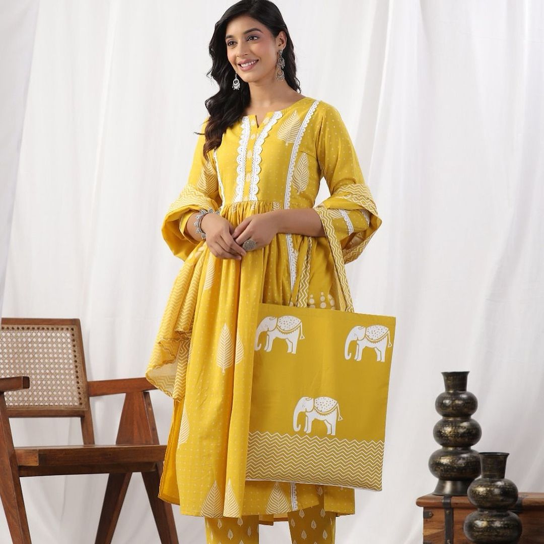 Jaipur cotton candy suits Look Nyra cut out of a dreamy movie set as you turn around and walk in this elegant flaired suit ! The perfect of traditional wear